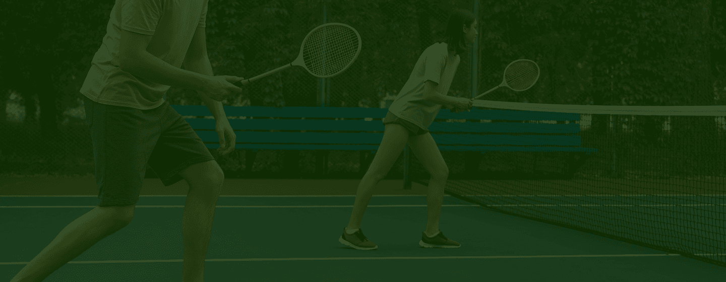 Badminton players on court